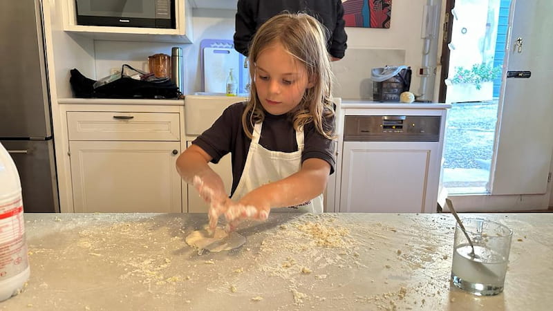 girl making pasta