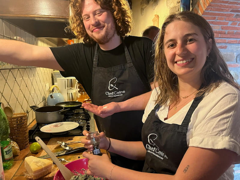 couple learning to make italian food